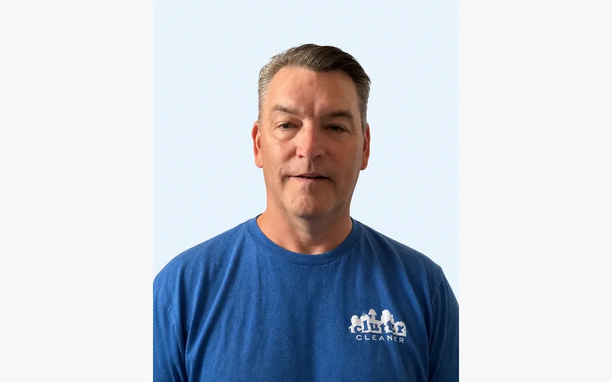 Seth Gregg, president of Clutter Cleaner South Carolina, shown in his existing team portrait