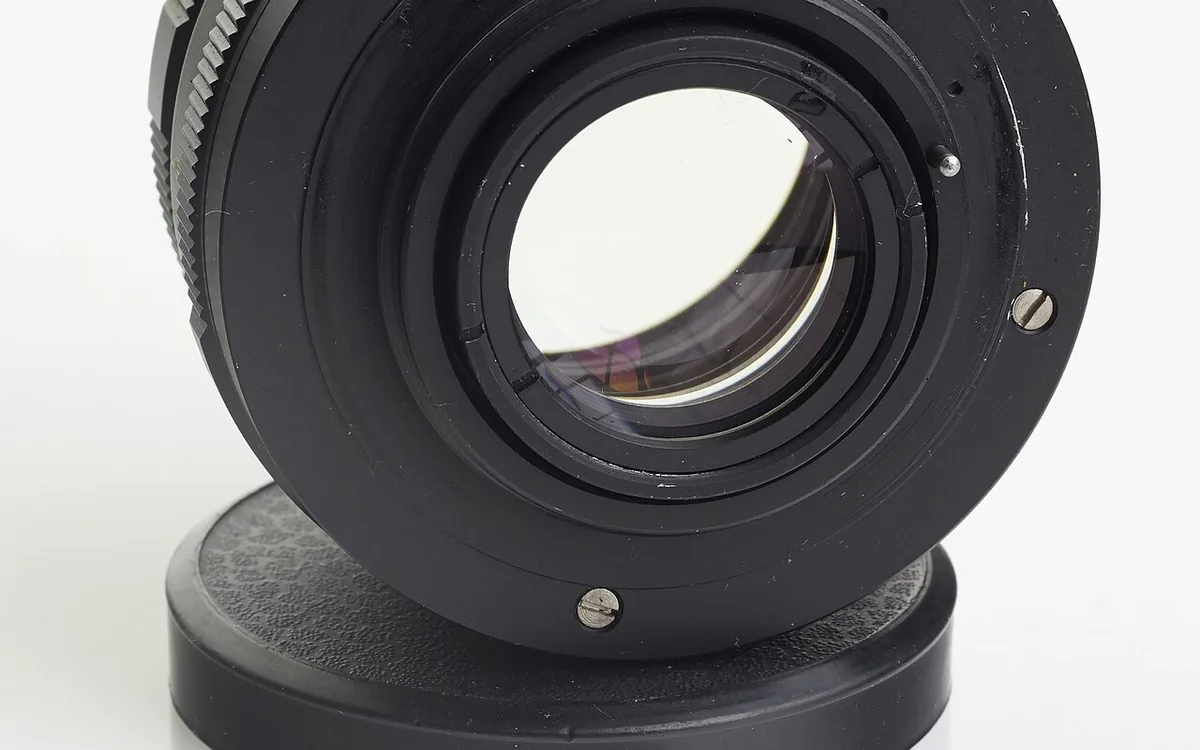 Rear glass and metal mount of a detached camera lens